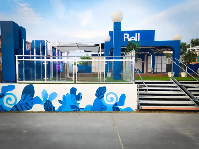 Bell-branded festival structure with printed wall mural