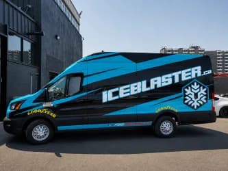 Ford Transit van wrapped in blue and black graphics for Iceblaster