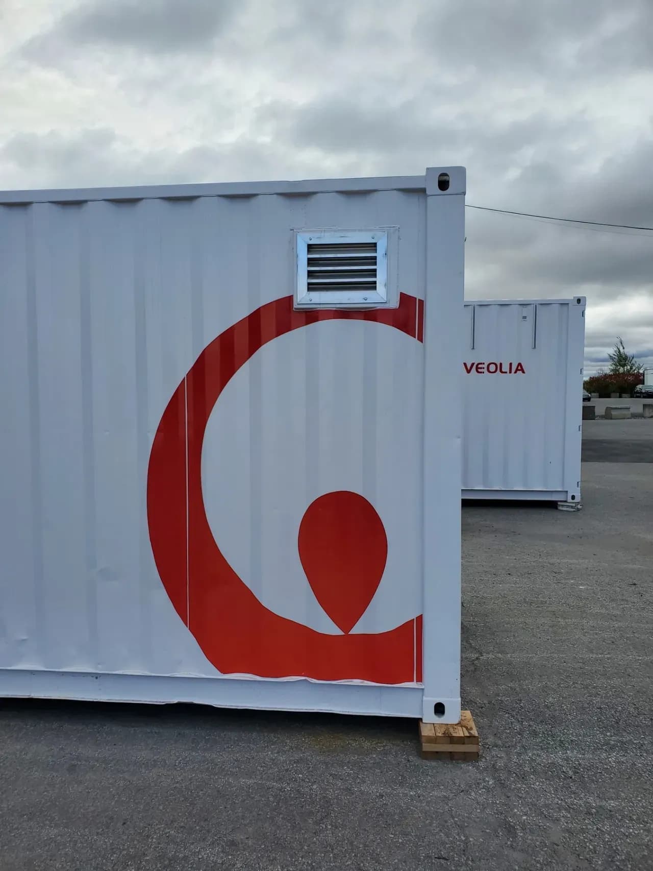 Site container wrapped with the Veolia logo